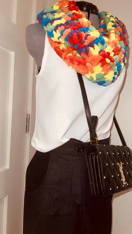 Floral scarf and studded bag styled with a white top