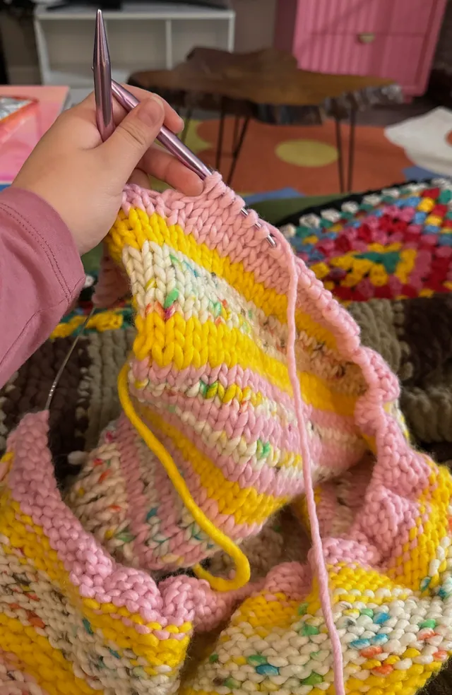 Pink and yellow knit in progress